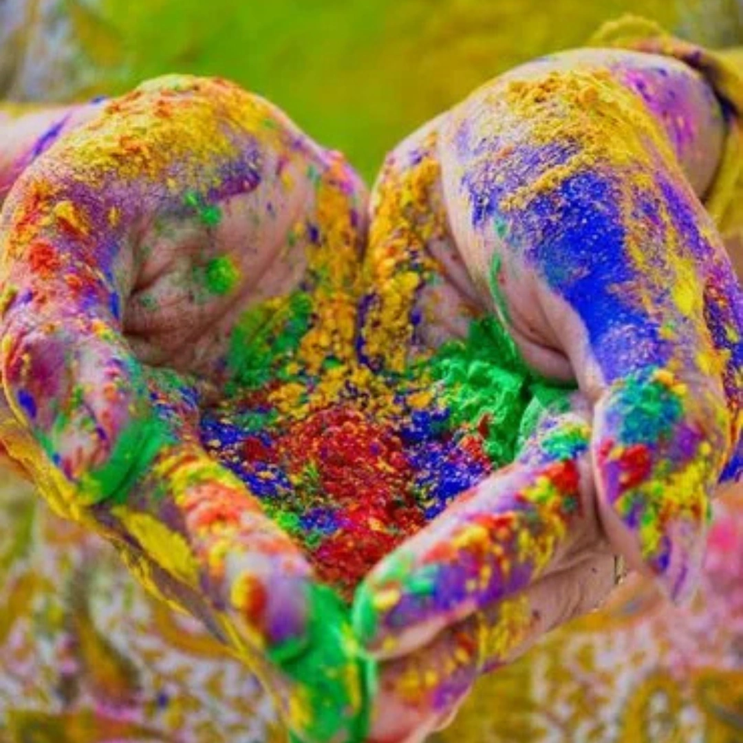 People celebrating Holi with vibrant Holi colors and gulal